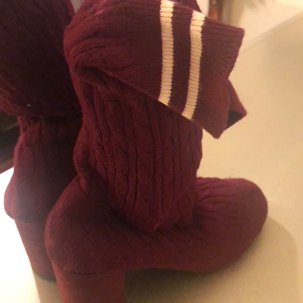 Sock over boot style mid calf boots.